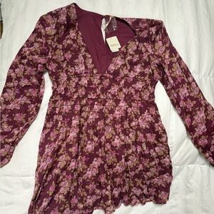 Free people New with tags!! Floral Long Sleeve top. Brand new
